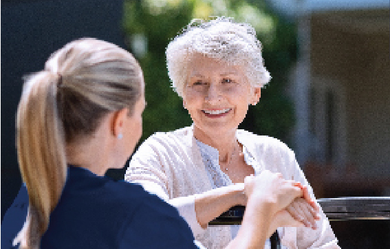 Image, elderly woman talking to nurse